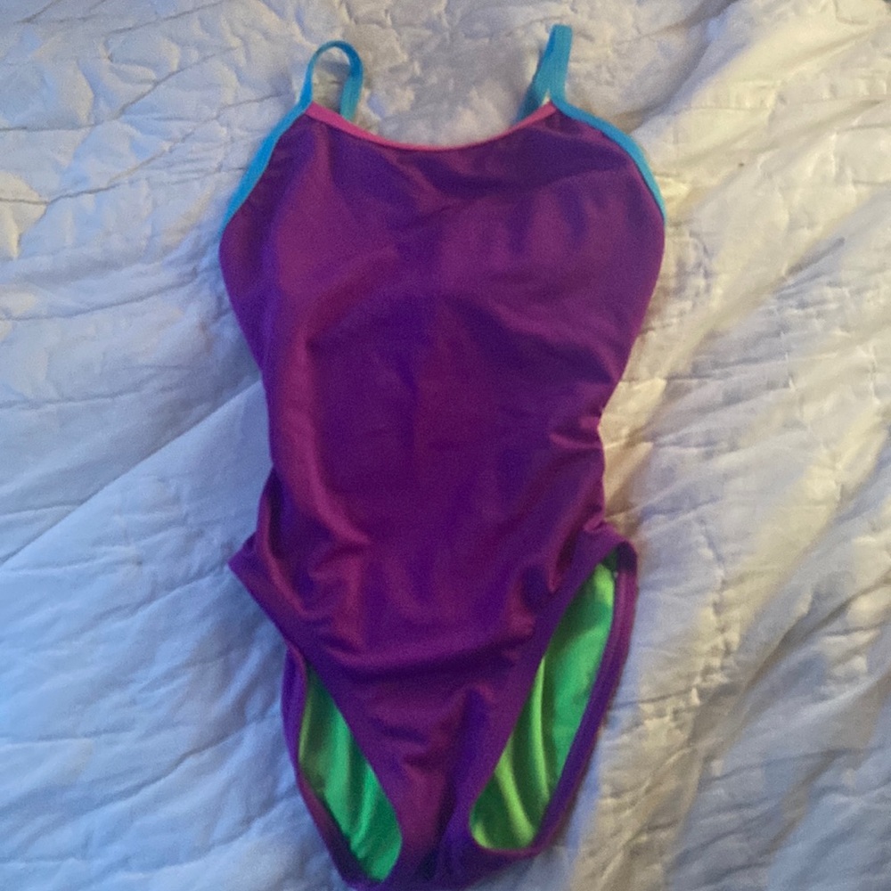 This bathing suit is a little bit tight in the stomach area.